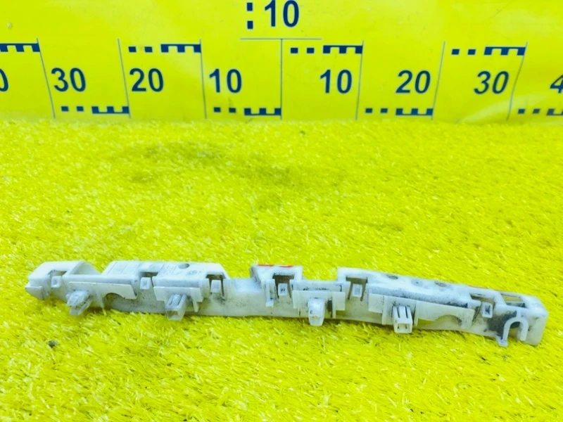 Фото для Крепление бампера NISSAN NV200 VM20 HR16DE 2014/Цвет K23 перед. прав. (б/у)